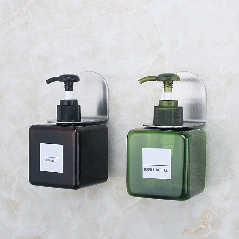 Wall holder for soap bottles in the bathroom