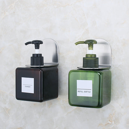 Wall holder for soap bottles in the bathroom